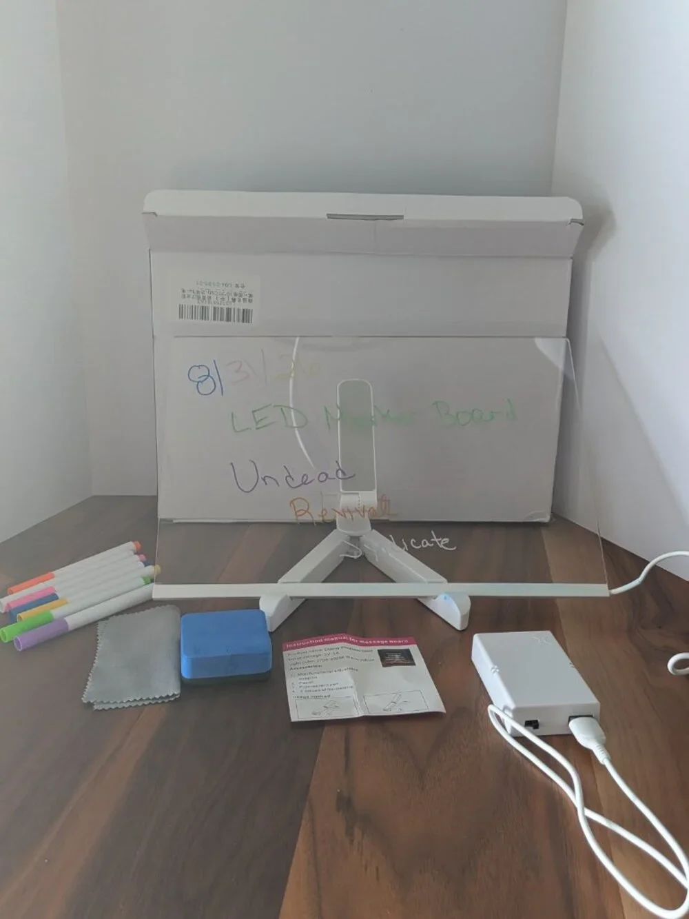 Clear LED Message Board w/ Stand Base, USB Cable, Battery Box, And Markers unde